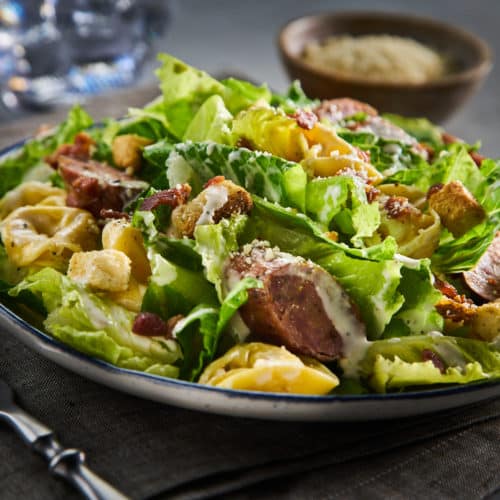 Grilled Italian Sausage, Bacon and Tortellini Caesar Salad