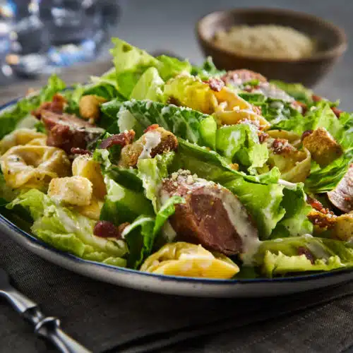 Grilled Italian Sausage, Bacon and Tortellini Caesar Salad