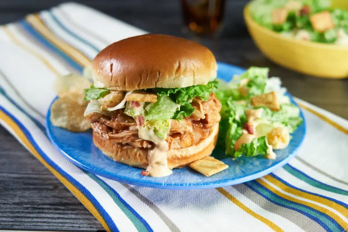 Pulled BBQ Chicken Sandwich with Bacon Thousand Island Chopped Salad