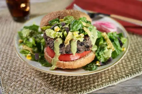 Southwest Black Bean Burger with Avocado Salad Topping