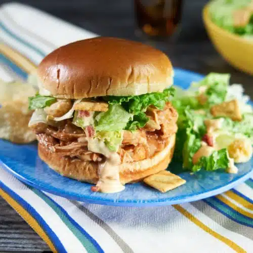 Pulled BBQ Chicken Sandwich with Bacon Thousand Island Chopped Salad