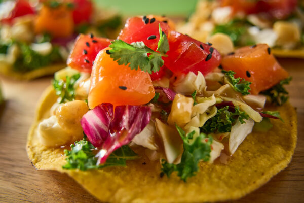 Salmon and Tuna Poke Tostadas with Zesty Hawaiian Crunch Salad